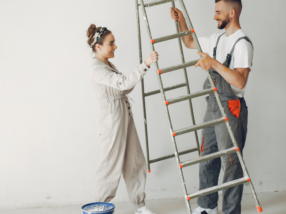 Young cute couple repairs room1